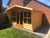 12x8 summerhouse 2ft roof overhang & tapered sides, long window double doors