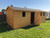 20x10 apex garage/shed (no floor bolted on to Concrete base) 7ft double doors,single door 4 windows (shed)