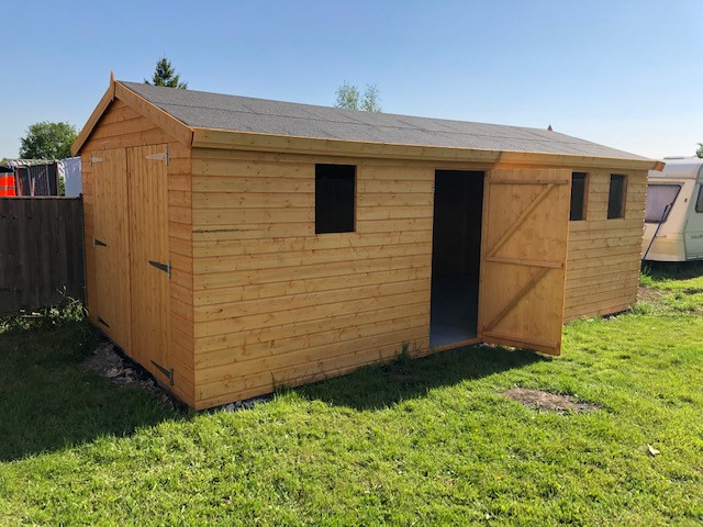 20x10 apex garage/shed (no floor bolted on to Concrete base) 7ft double doors,single door 4 windows (shed)