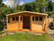 16x10 summerhoues 2ft roof overhang and porch {16x12} windows top half of 16ft apex only