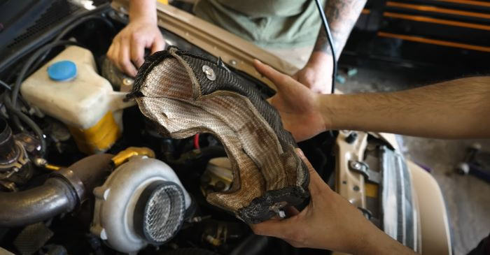 Exoracing heat management products used to control engine bay heat near fuel lines and wiring