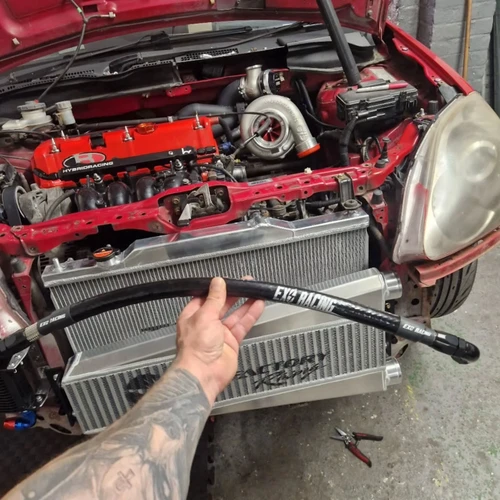Exoracing silicone heat sleeve installed to turbo ep3 2