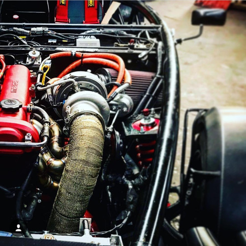 Exoracing titanium fibreglass exhaust wrap texture close up