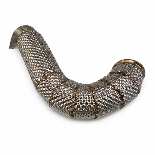 Finished custom exhaust section covered with embossed stainless steel heat shielding