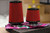 Two red Exoracing cone air filters of different heights