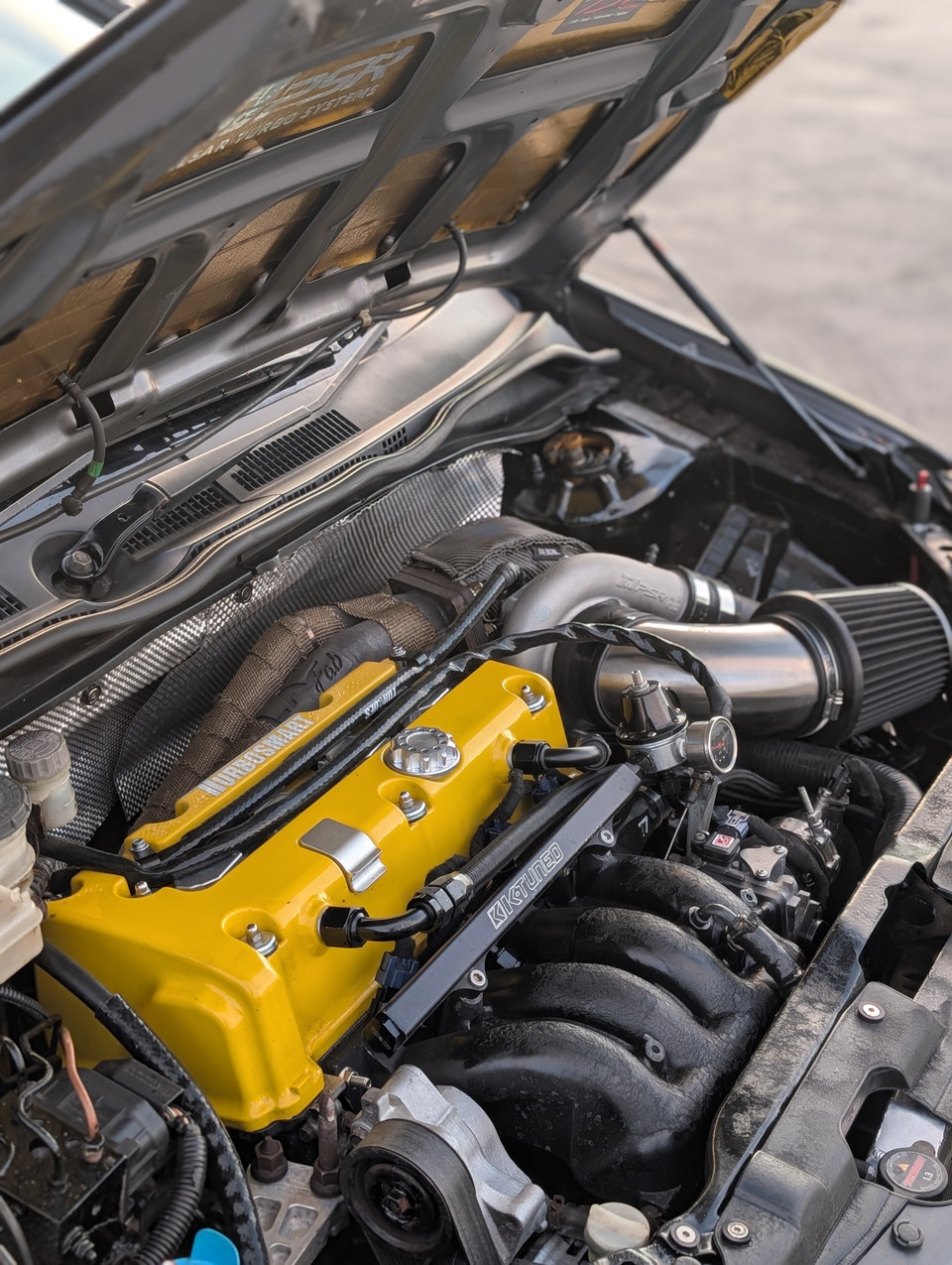 Nathan&rsquo;s K20 turbo EP3 engine bay showing the fitted turbo blanket and surrounding components