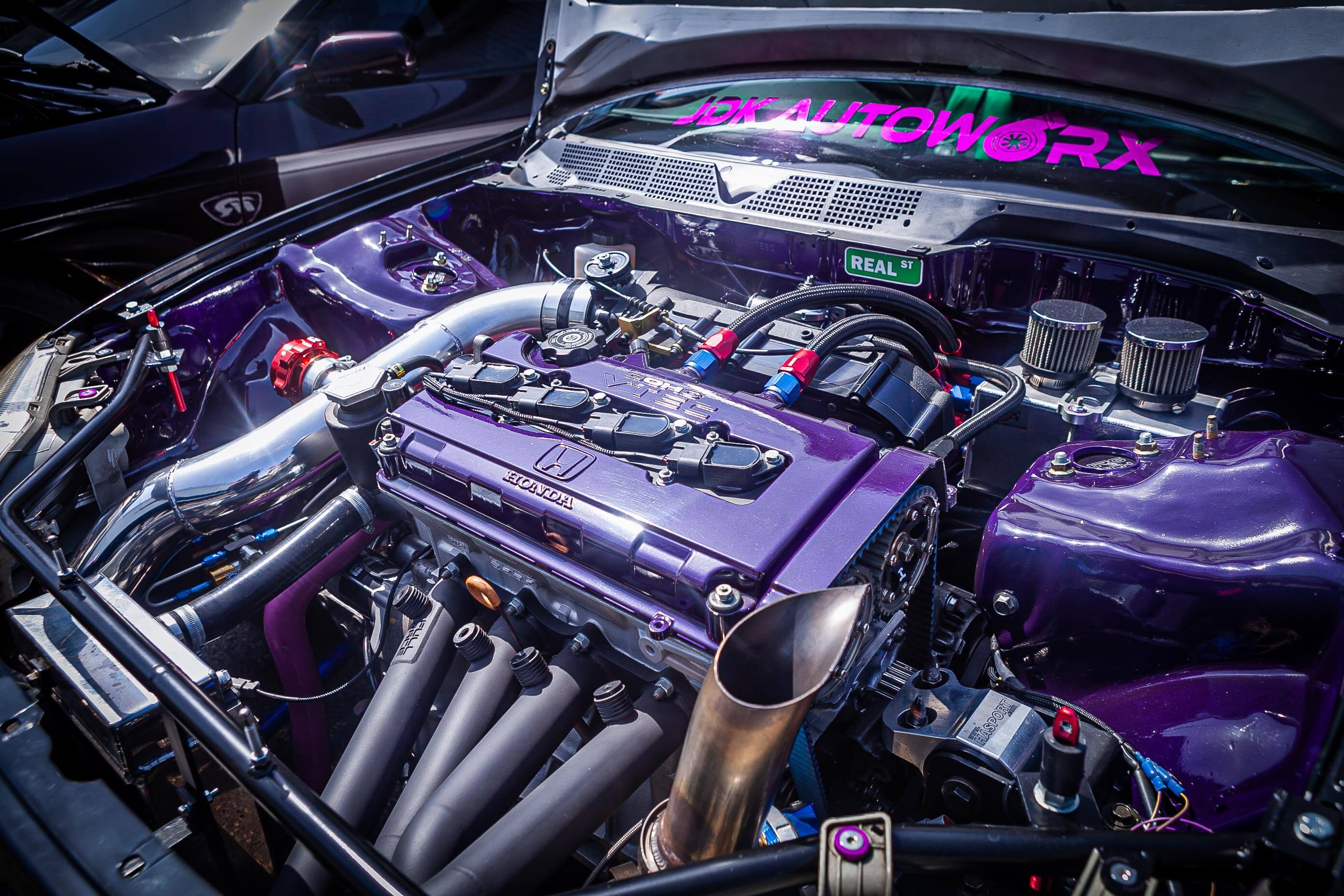 Engine bay catch can setup with visible breather hose routing