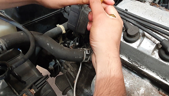 Undoing radiator hose clamps before removing old rubber hoses
