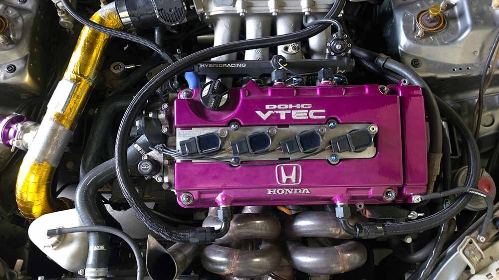 Modified AWD Civic engine bay showing tight engine bay packaging
