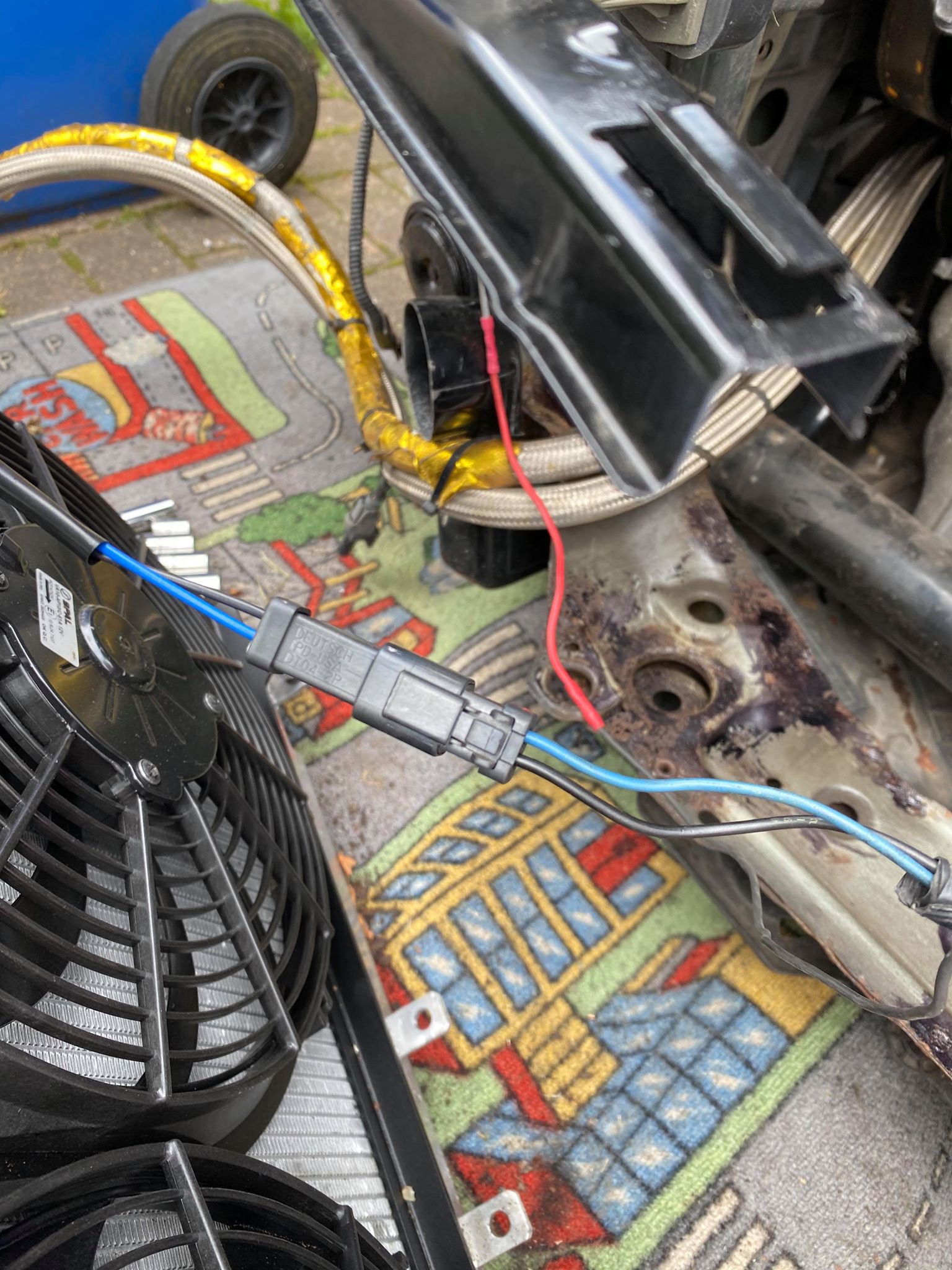 Honda Civic FN2 fan shroud wiring laid out before connecting the SPAL fans