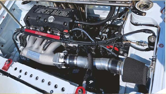 Modified engine bay AN line routing example for planning catch can and breather hose layouts