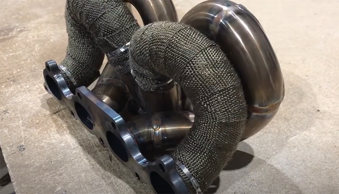 4 branch exhaust manifold with installed exhaust wrap