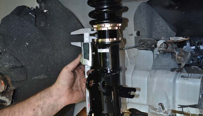 BC Racing coilovers installation image showing why suspension condition should be checked before fitting