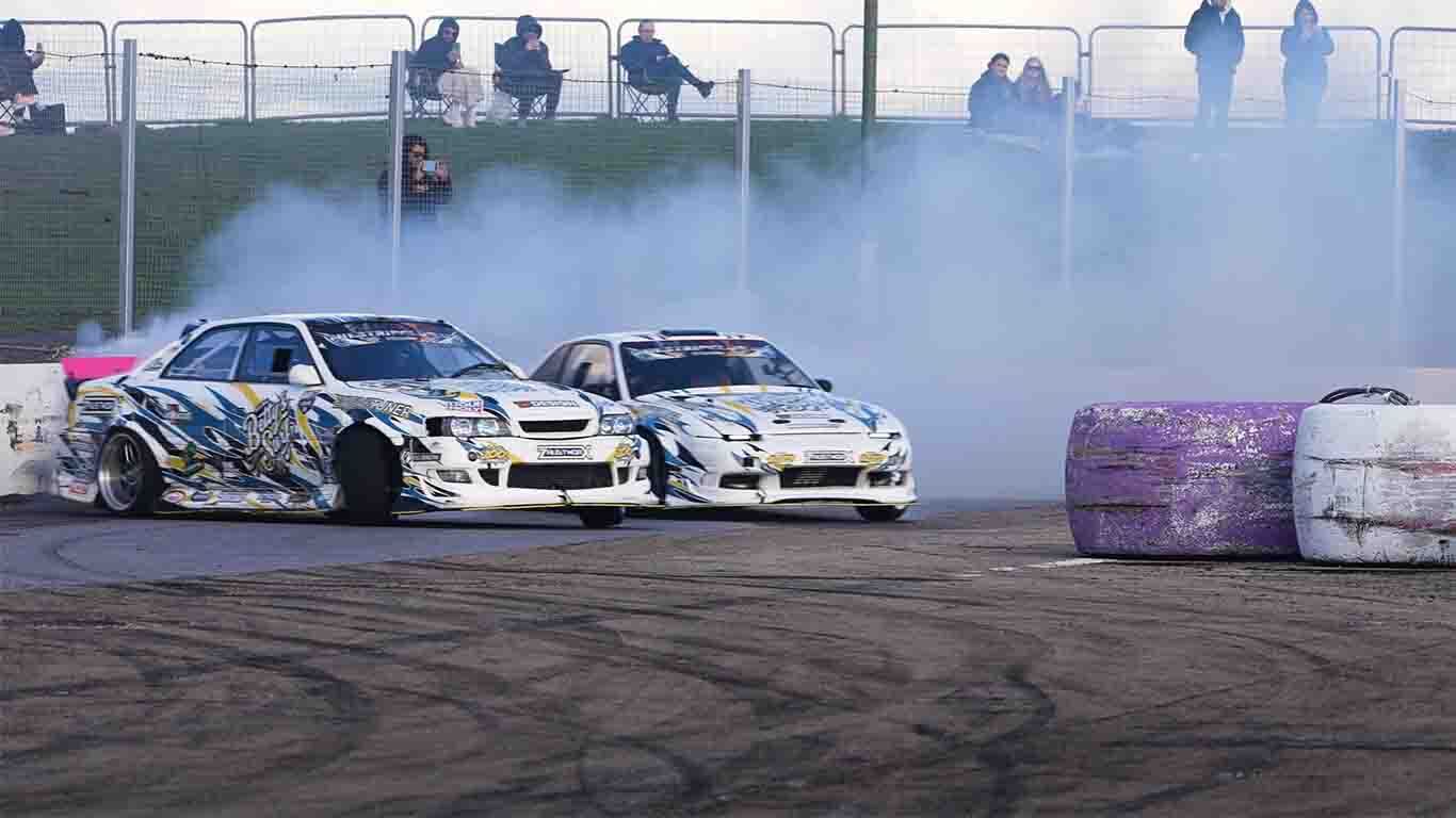 Matt from Exoracing with Martin Wonnacott and his Toyota Chaser at an event