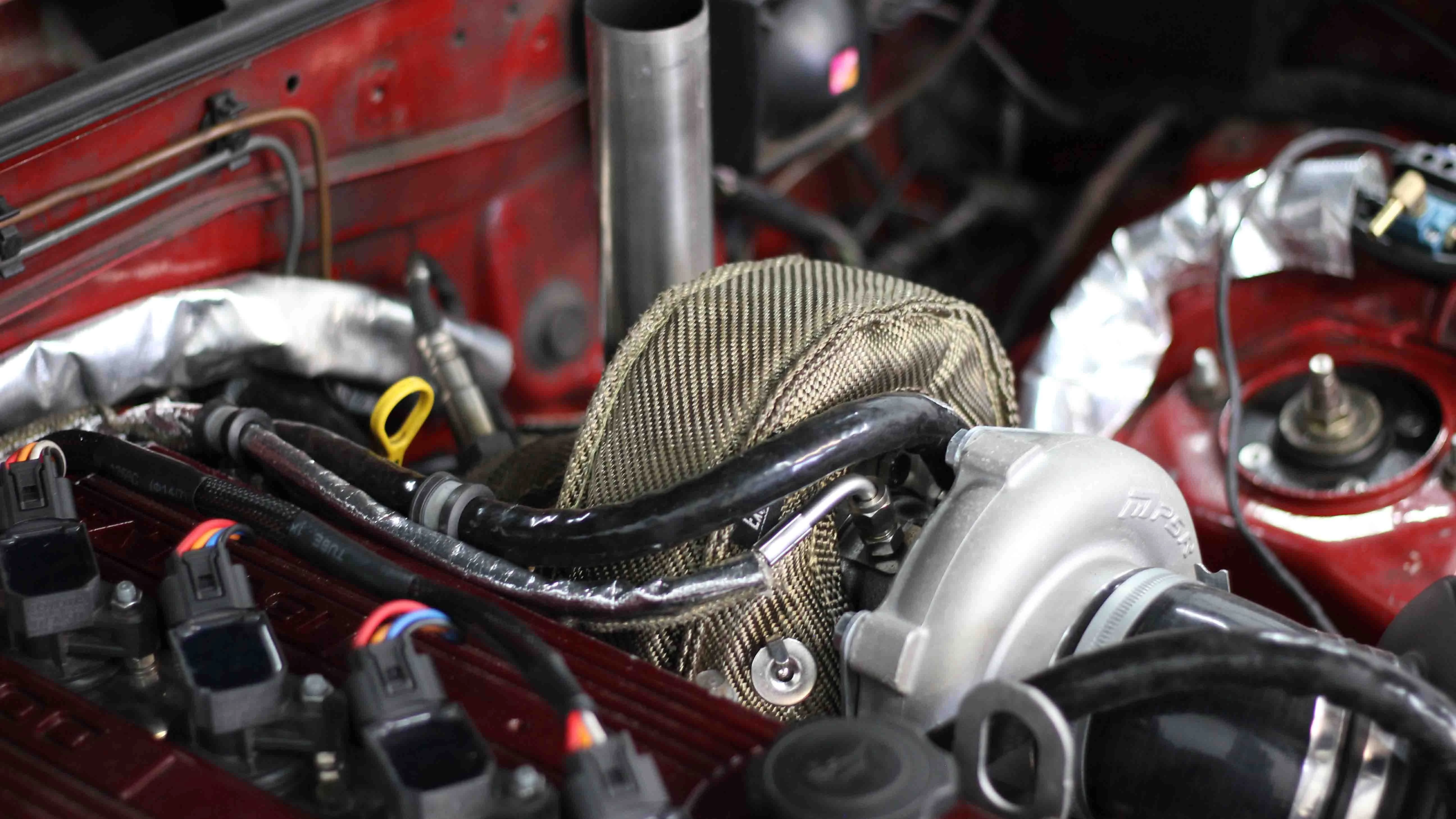 Toms MX5 with an Exoracing turbo blanket and silicone heat sleeve fitted