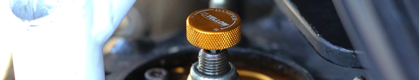 yellow speed racing damper adjustment banner