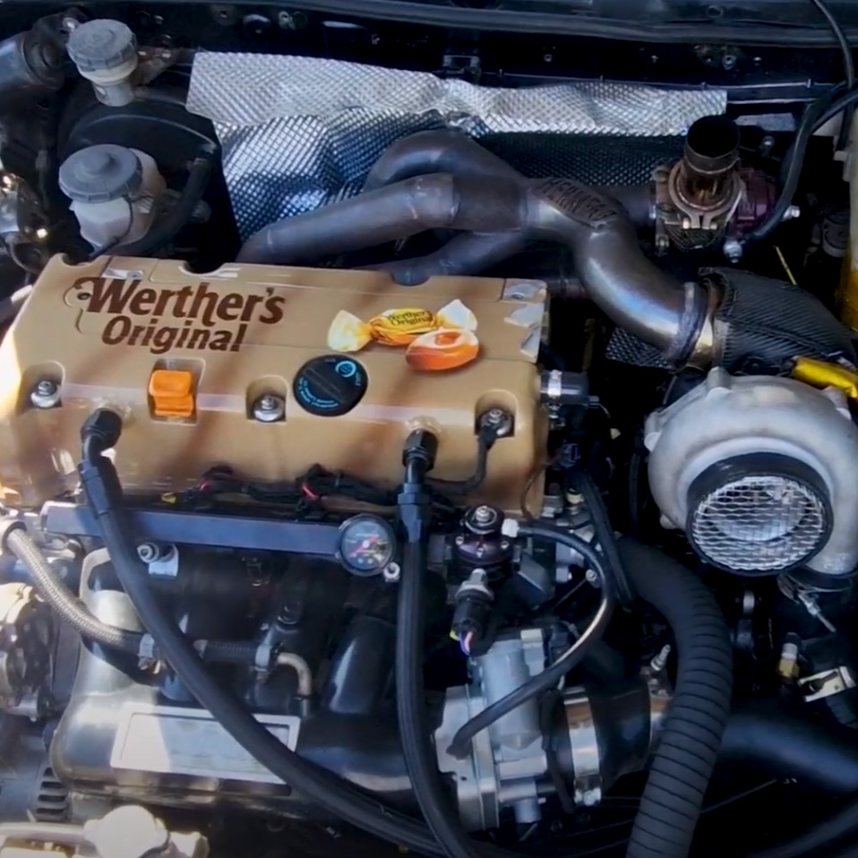 Embossed aluminium shielding separating exhaust heat from vulnerable engine bay components