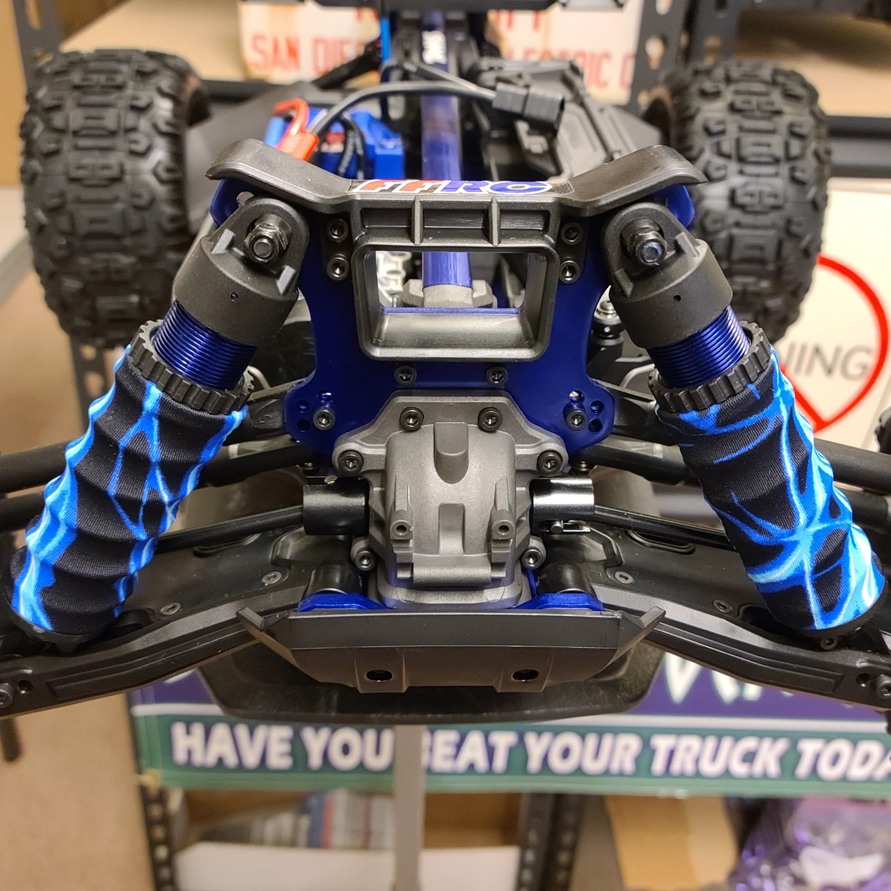 FOR MAXX Shock boots fit the new Traxxas Sledge perfect!  Check out the lightning blue versions here on the stock truck!