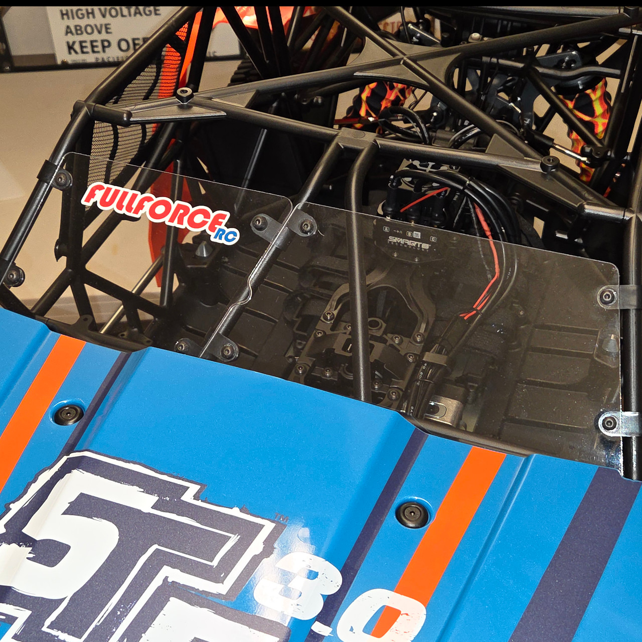 Each of the two parts attaches with 4 clamps and hardware.  Easiest install is to remove the two side and lid panels.