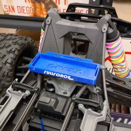 Traxxas X-MAXX Accessory Battery tray simply mounts to the rear shock tower.  