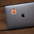 Move Those Buns sticker on MacBook, retro workout meme vinyl decal
