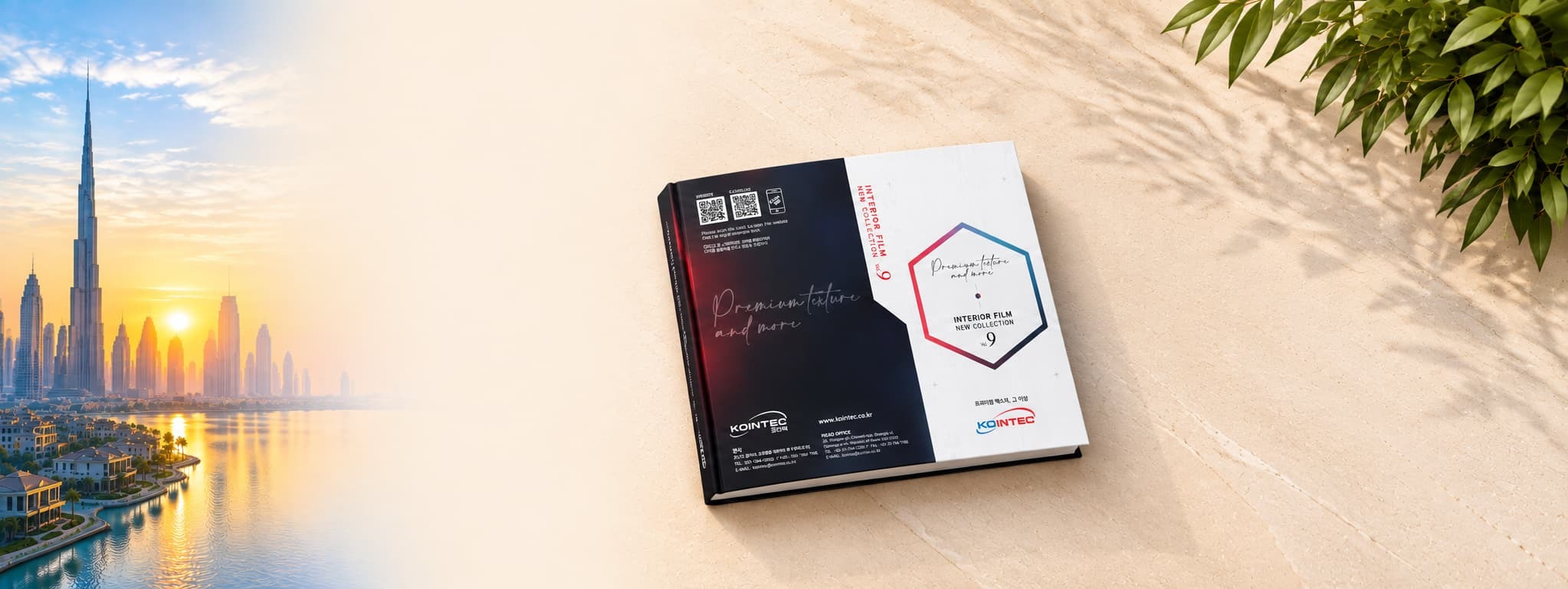 KOINTEC interior film sample book on a sunlit stone surface beside the Dubai skyline