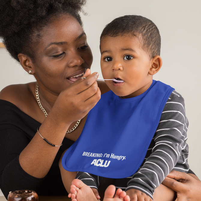 Person feeding baby