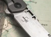 BOKER PLUS 01BO909DAM ME 109 DAMST FOLDER. 3.15" DAMASCUS CLIP POINT BLADE. TOXIC STORM FATCARBON & TITANIUM FRAMELOCK HANDLE. BLADE DETAIL REVERSE CLOSEUP. CUTLERY SHOPPE