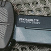 SOG KNIVES 15-61-02-57 PENTAGON FDE OTF AUTOMATIC KNIFE. 3.79" BLACK TINI FINISH PLAIN EDGE S35VN BLADE. FDE ANODIZED ALUMINUM HANDLE. BLADE CLOSEUP. CUTLERY SHOPPE