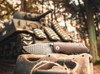 BOKER SOLINGEN 110662DAM M4 SHERMAN DAMAST. 3.03" PLAIN EDGE DAMASCUS BLADE. MICARTA SCALE W/TITANIUM FRAME LOCK HANDLE. TANK PHOTO. CUTLERY SHOPPE