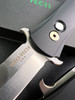PRO-TECH 1921-MOP LARGE DON AUTOMATIC. 4.5" SATIN FINISH 154CM BLADE. BLACK ANODIZED MACHINE CURVED ALUMINUM HANDLE. MOTHER OF PEARL BUTTON. BUTTON CLOSEUP. CUTLERY SHOPPE