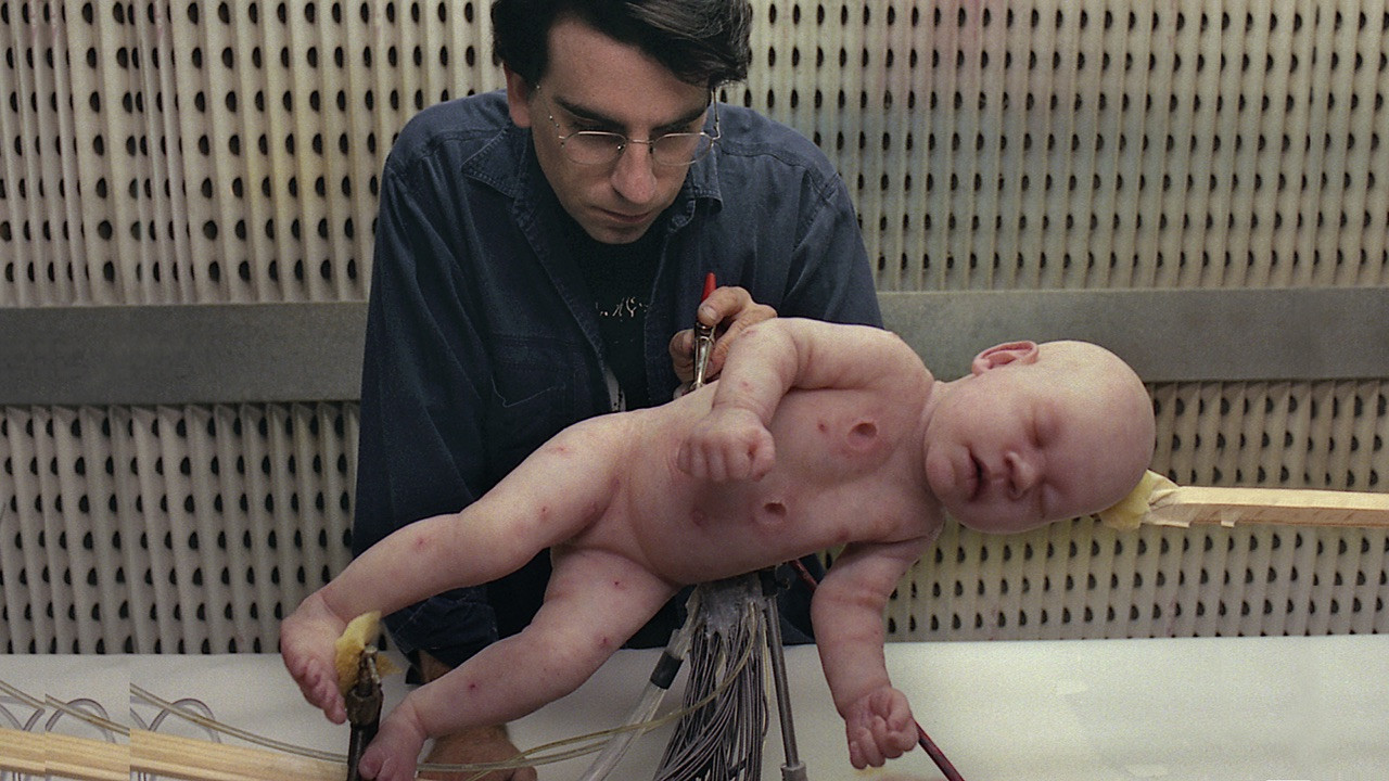 Take a look at how they created the animatronic baby in 'The Matrix'