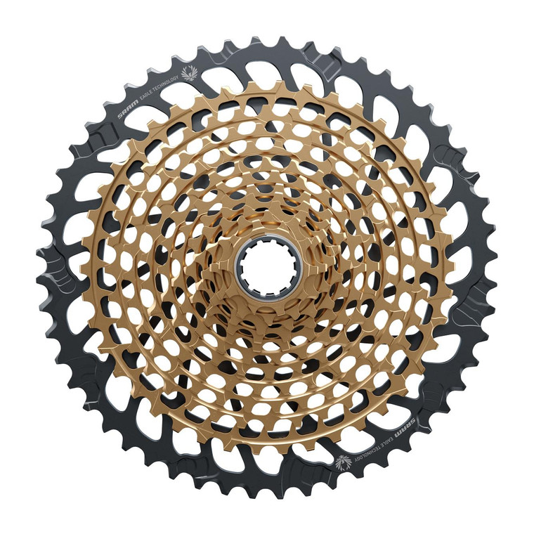 Sram: <p>RANGE OF DREAMS</p> <p>Whether for prized race machines or the build of their dreams, the XG-1299 cassette is the ultimate, giving riders unprecedented 520-percent range thanks to the new 10-52 tooth-span. Stronger racers are now free to choose larger chainrings for more top-end speed, without sacrificing climbing range. More time is spent higher up in the cassette where athletes power transfer is most efficient and wear is minimized. Featuring the industry&rsquo;s strongest X-Dome&trade; architecture and proven XD&trade; driver body, it&rsquo;s also backwards compatible to give riders even more Eagle&trade; upgrade options for their current bikes. With multiple Olympic, World Cup and World Championship titles, it also matches up perfectly to XX1 Eagle AXS&trade; enabled componentry. The XG-1299 cassette utilizes the full depth of the new Eagle&trade; Colorsystem. Available in Black to Gold to Rainbow and all-new Copper, the XG-1299 cassette completes the expression of the worlds most accomplished and sought after bikes.</p><p><span style="text-decoration: underline;"><strong>FEATURES</strong></span></p><ul><li>Stronger riders can increase chainring size for speed, without sacrificing climbing.</li><li>Eagle Colorsystem lets the cassette and chain express the look of the bike. Available in Black, Gold, Rainbow and all-new Copper.</li><li>Provides a massive 520-percent gear range.</li></ul> <p><span style="text-decoration: underline;"><strong>SPECIFICATIONS</strong></span><br /><strong>Speed (CS):</strong> 12s<br /><strong>Gearing:</strong> 10-52t<br /><strong>Cog finish (Cassette):</strong> Copper, Gold, Rainbow<br /><strong>Technology (Cassette):</strong> XG<br /><strong>Cog sizes:</strong> 10-52t:10,12,14,16,18,21,24,28,32,36,42,52<br /><strong>Driver body interface:</strong> XD</p>