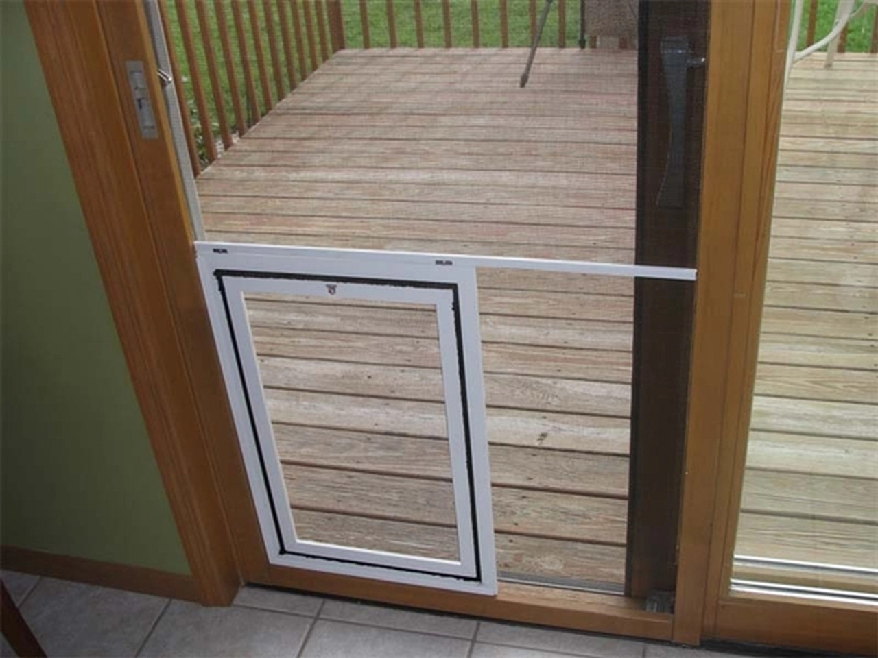 Dog gate for sliding clearance glass door