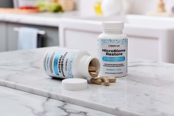 MicroBiome Restore™ in Kitchen with Capsules