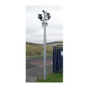 CCTV column, static, steel square buried into grass with 3 cameras and two lights mounted