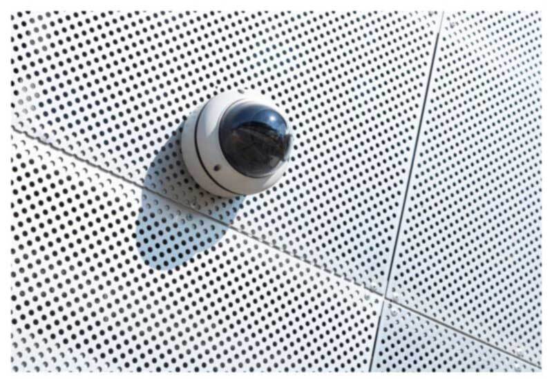 Security camera mounted to wall