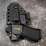 GRITR holster claw features a standard 3/4" hole spacing but requires the mounting holes to be positioned directly along the vertical sight-line/slide axis of the holster body