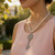 Faux Pearl Sweater Necklace with Crystal Key Pendant – Costume Jewelry
