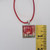 One-of-a-Kind Original Stamp Pendant Necklace – Red Rope Chain