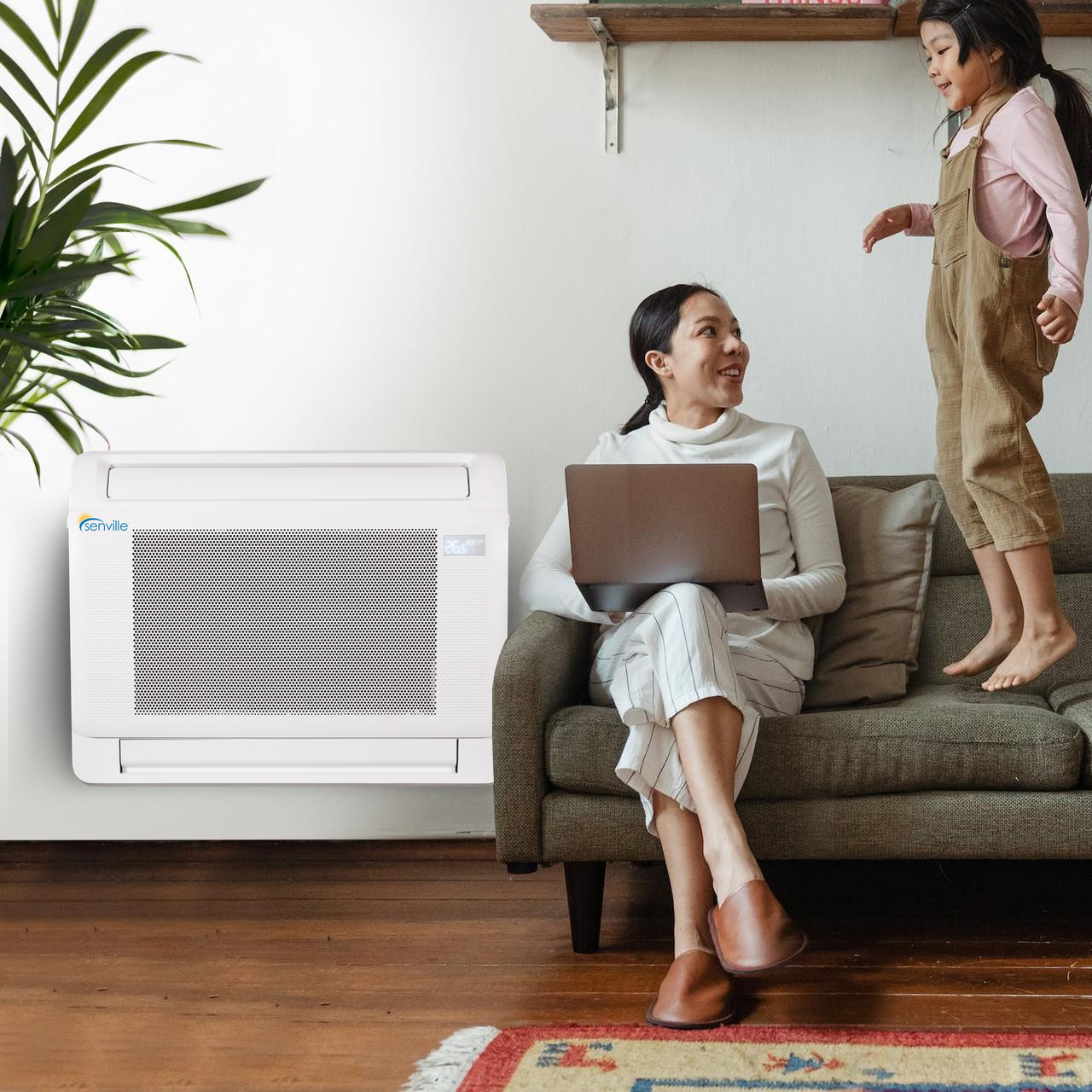 Senville floor-mounted mini split installed beside a living-room sofa