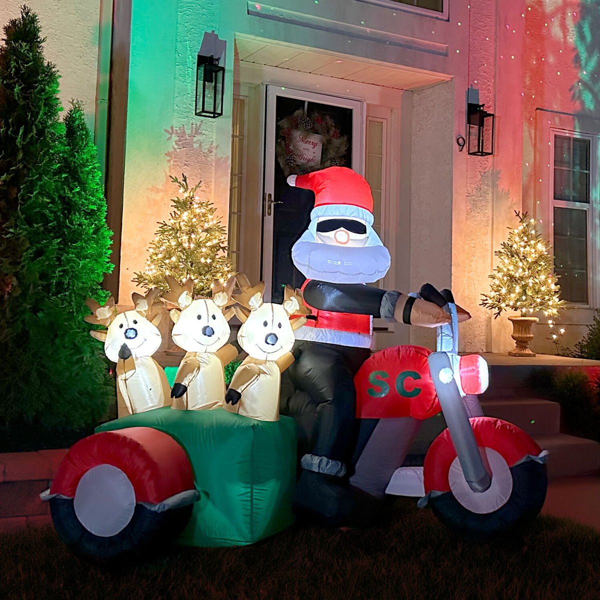 Fraser Hill Farm 6-Ft. Tall Prelit Santa on Motorcycle with Reindeer Sidecar Inflatable