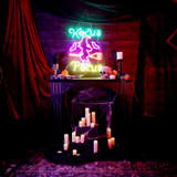 1.9-Ft. Neon Multicolor LED Witch with Flying Broom Wall Decoration for Indoors & Covered Outdoors