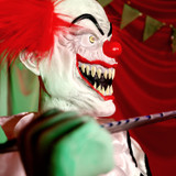 4.1-Ft. Sitting Scareclown with Saw & Candy Animatronic