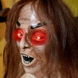 3.8-Ft. Sitting Animated Creepy Woman Holding Doll Animatronic