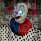 Haunted Hill Farm Life-Size Animatronic Spooky Clown with Light-up Colorful Eyes and Spinning Movement