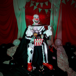 4.1-Ft. Sitting Scareclown with Saw & Candy Animatronic