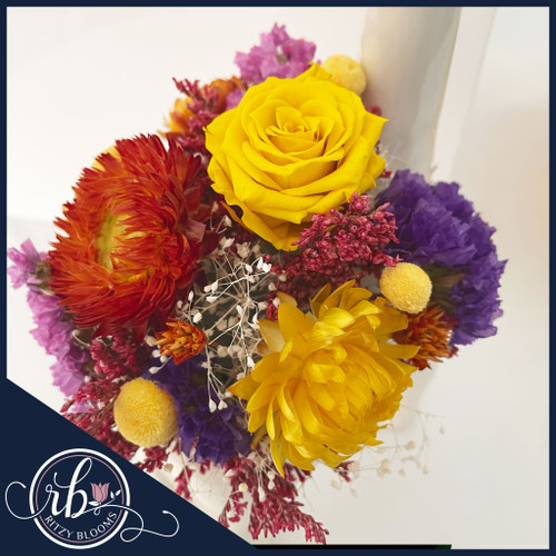 9.5-inch white ceramic giraffe vase with colorful preserved flowers by Ritzy Blooms