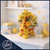 Sunny Giraffe preserved flower arrangement with yellow and orange roses by Ritzy Blooms Fort Lauderdale
