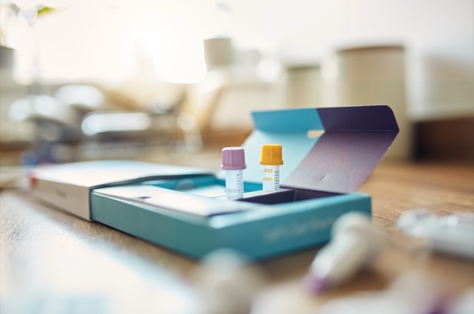 Clinical trial kit components laid out in a tray